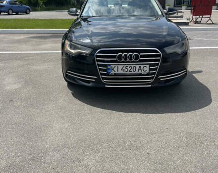 Черный Ауди А6, объемом двигателя 2 л и пробегом 328 тыс. км за 12500 $, фото 1 на Automoto.ua