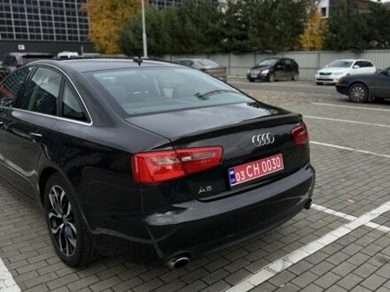 Чорний Ауді А6, об'ємом двигуна 2 л та пробігом 261 тис. км за 11500 $, фото 1 на Automoto.ua