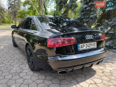 Черный Ауди А6, объемом двигателя 2 л и пробегом 200 тыс. км за 14500 $, фото 1 на Automoto.ua