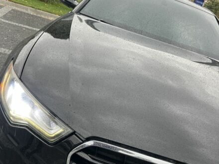 Черный Ауди А6, объемом двигателя 2 л и пробегом 230 тыс. км за 10400 $, фото 1 на Automoto.ua