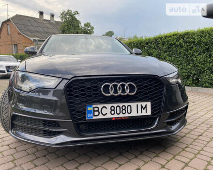 Черный Ауди А6, объемом двигателя 3 л и пробегом 132 тыс. км за 19500 $, фото 1 на Automoto.ua