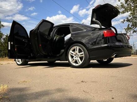 Черный Ауди А6, объемом двигателя 1.98 л и пробегом 278 тыс. км за 13000 $, фото 1 на Automoto.ua