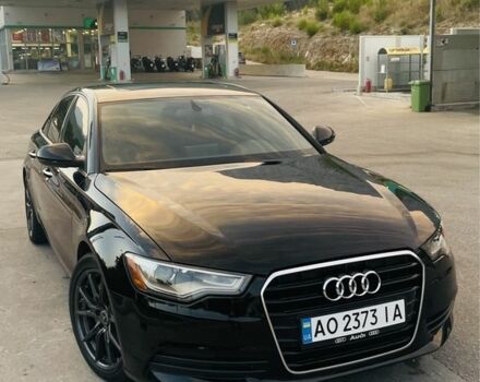 Черный Ауди А6, объемом двигателя 2 л и пробегом 165 тыс. км за 14600 $, фото 1 на Automoto.ua