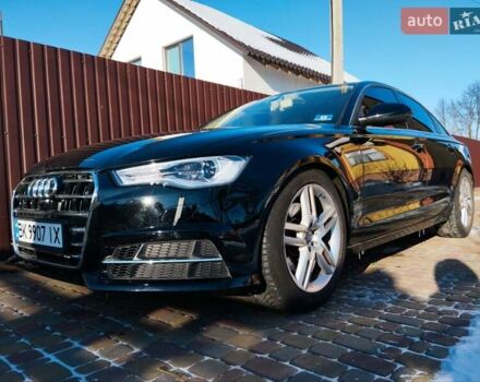 Чорний Ауді А6, об'ємом двигуна 2 л та пробігом 212 тис. км за 13800 $, фото 1 на Automoto.ua