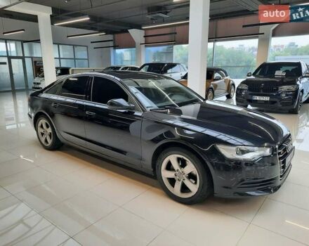 Черный Ауди А6, объемом двигателя 2 л и пробегом 299 тыс. км за 12900 $, фото 1 на Automoto.ua