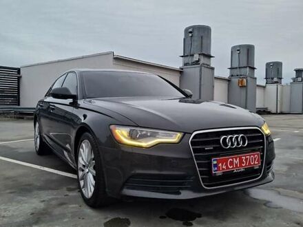 Черный Ауди А6, объемом двигателя 2 л и пробегом 185 тыс. км за 12600 $, фото 1 на Automoto.ua