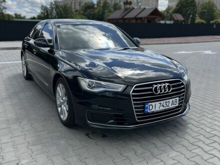 Черный Ауди А6, объемом двигателя 2 л и пробегом 270 тыс. км за 17999 $, фото 1 на Automoto.ua