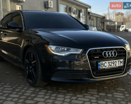 Черный Ауди А6, объемом двигателя 2 л и пробегом 231 тыс. км за 12500 $, фото 1 на Automoto.ua