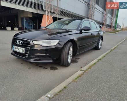 Черный Ауди А6, объемом двигателя 2 л и пробегом 294 тыс. км за 12800 $, фото 1 на Automoto.ua