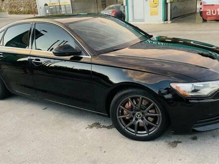 Черный Ауди А6, объемом двигателя 2 л и пробегом 165 тыс. км за 14600 $, фото 1 на Automoto.ua
