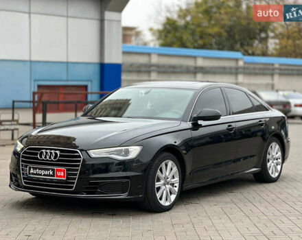 Черный Ауди А6, объемом двигателя 2 л и пробегом 152 тыс. км за 18990 $, фото 1 на Automoto.ua
