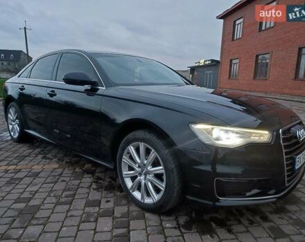 Черный Ауди А6, объемом двигателя 2 л и пробегом 247 тыс. км за 16700 $, фото 1 на Automoto.ua
