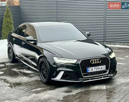 Черный Ауди А6, объемом двигателя 1.97 л и пробегом 159 тыс. км за 22600 $, фото 1 на Automoto.ua