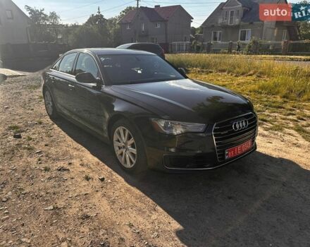 Черный Ауди А6, объемом двигателя 2 л и пробегом 170 тыс. км за 16200 $, фото 1 на Automoto.ua