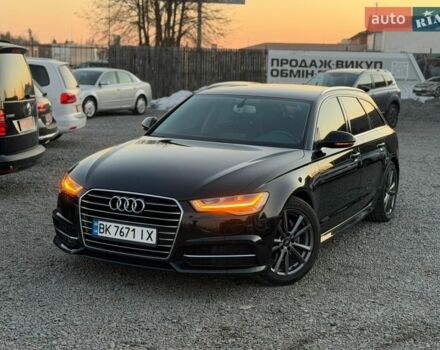 Черный Ауди А6, объемом двигателя 2 л и пробегом 205 тыс. км за 17850 $, фото 1 на Automoto.ua