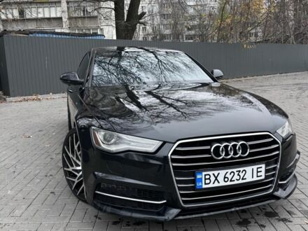 Черный Ауди А6, объемом двигателя 2 л и пробегом 160 тыс. км за 14800 $, фото 1 на Automoto.ua