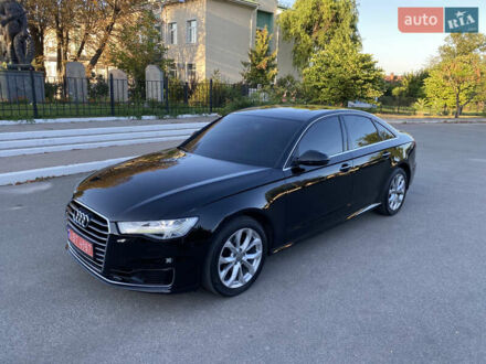 Черный Ауди А6, объемом двигателя 2 л и пробегом 154 тыс. км за 19900 $, фото 1 на Automoto.ua