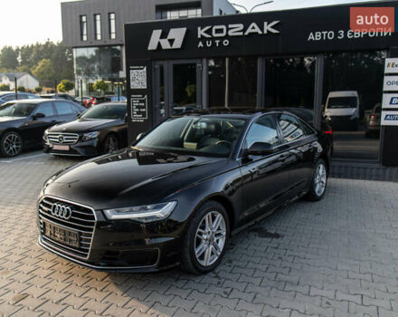 Черный Ауди А6, объемом двигателя 2 л и пробегом 118 тыс. км за 25900 $, фото 1 на Automoto.ua
