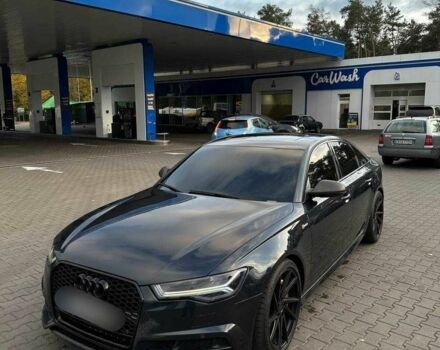 Черный Ауди А6, объемом двигателя 3 л и пробегом 140 тыс. км за 343 $, фото 1 на Automoto.ua