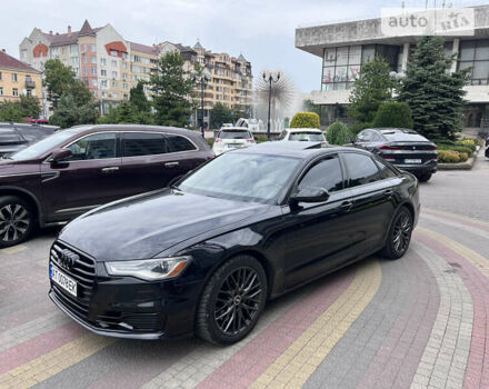 Черный Ауди А6, объемом двигателя 1.98 л и пробегом 253 тыс. км за 15800 $, фото 1 на Automoto.ua