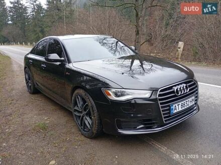 Черный Ауди А6, объемом двигателя 2 л и пробегом 317 тыс. км за 18900 $, фото 1 на Automoto.ua