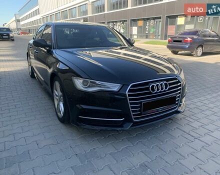 Черный Ауди А6, объемом двигателя 2 л и пробегом 303 тыс. км за 21900 $, фото 1 на Automoto.ua