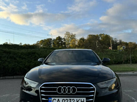 Черный Ауди А6, объемом двигателя 2 л и пробегом 180 тыс. км за 15000 $, фото 1 на Automoto.ua