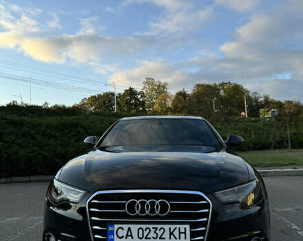 Черный Ауди А6, объемом двигателя 2 л и пробегом 180 тыс. км за 15000 $, фото 1 на Automoto.ua
