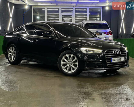 Черный Ауди А6, объемом двигателя 2 л и пробегом 100 тыс. км за 20900 $, фото 1 на Automoto.ua