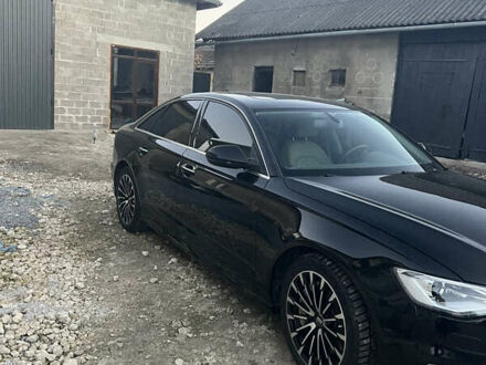 Черный Ауди А6, объемом двигателя 2 л и пробегом 118 тыс. км за 20500 $, фото 1 на Automoto.ua