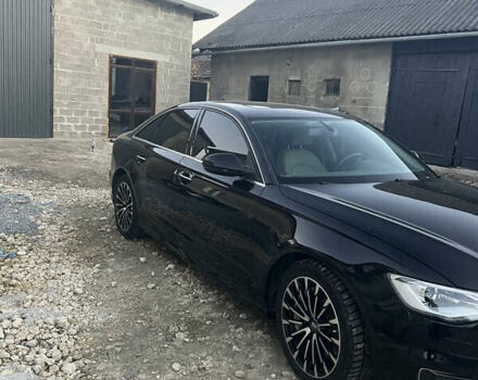 Черный Ауди А6, объемом двигателя 2 л и пробегом 118 тыс. км за 20500 $, фото 1 на Automoto.ua
