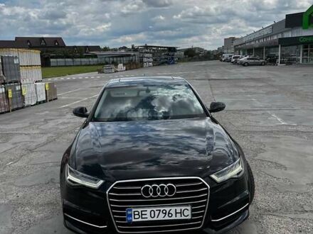 Черный Ауди А6, объемом двигателя 1.98 л и пробегом 245 тыс. км за 21000 $, фото 1 на Automoto.ua