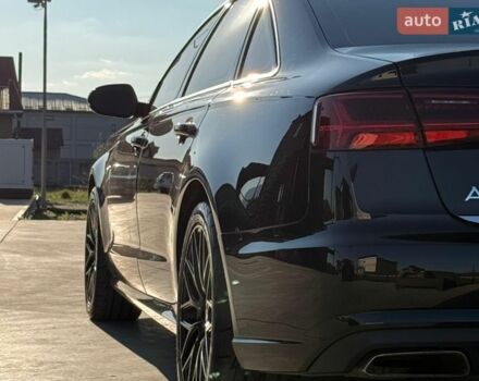 Черный Ауди А6, объемом двигателя 1.98 л и пробегом 94 тыс. км за 25400 $, фото 1 на Automoto.ua