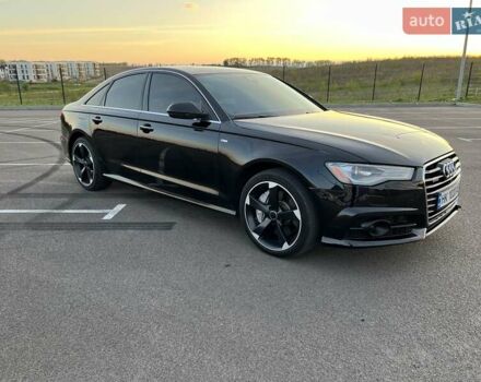 Черный Ауди А6, объемом двигателя 1.98 л и пробегом 130 тыс. км за 18800 $, фото 1 на Automoto.ua