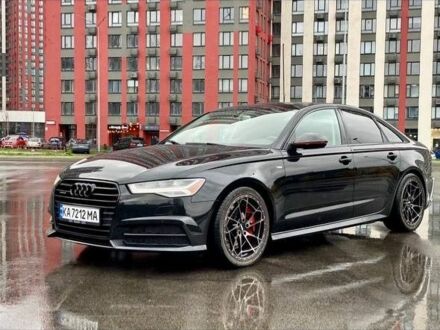 Черный Ауди А6, объемом двигателя 2 л и пробегом 200 тыс. км за 12000 $, фото 1 на Automoto.ua