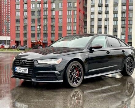 Черный Ауди А6, объемом двигателя 2 л и пробегом 200 тыс. км за 12000 $, фото 1 на Automoto.ua
