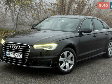 Черный Ауди А6, объемом двигателя 2 л и пробегом 250 тыс. км за 16000 $, фото 1 на Automoto.ua