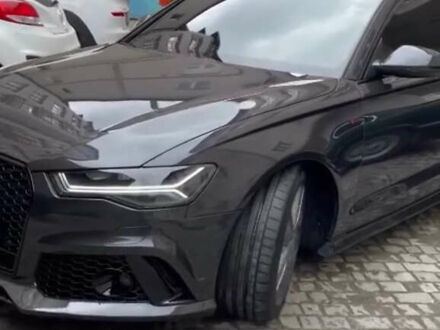 Черный Ауди А6, объемом двигателя 2 л и пробегом 210 тыс. км за 16500 $, фото 1 на Automoto.ua