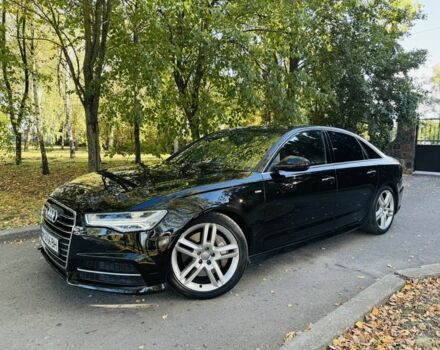 Черный Ауди А6, объемом двигателя 2 л и пробегом 68 тыс. км за 24500 $, фото 1 на Automoto.ua
