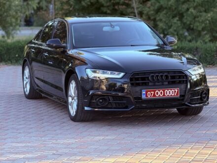 Черный Ауди А6, объемом двигателя 2 л и пробегом 189 тыс. км за 16400 $, фото 1 на Automoto.ua