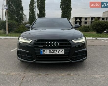 Чорний Ауді А6, об'ємом двигуна 2 л та пробігом 170 тис. км за 23900 $, фото 1 на Automoto.ua