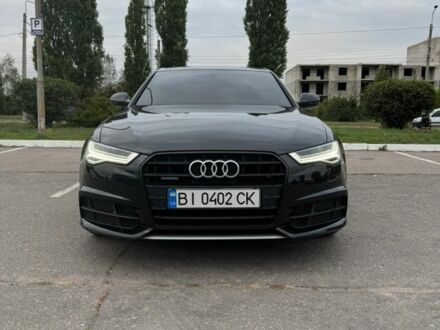 Черный Ауди А6, объемом двигателя 2 л и пробегом 170 тыс. км за 22499 $, фото 1 на Automoto.ua