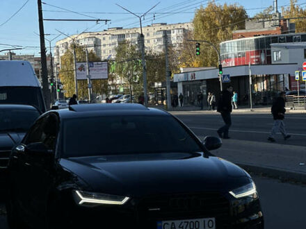 Черный Ауди А6, объемом двигателя 2 л и пробегом 124 тыс. км за 23500 $, фото 1 на Automoto.ua