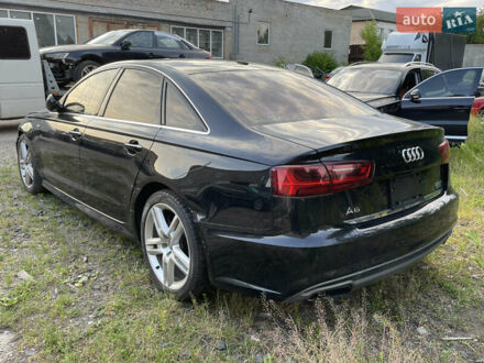 Черный Ауди А6, объемом двигателя 2 л и пробегом 218 тыс. км за 11800 $, фото 1 на Automoto.ua