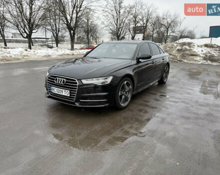 Черный Ауди А6, объемом двигателя 1.98 л и пробегом 162 тыс. км за 15700 $, фото 1 на Automoto.ua