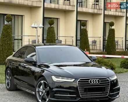 Черный Ауди А6, объемом двигателя 2 л и пробегом 163 тыс. км за 16199 $, фото 1 на Automoto.ua