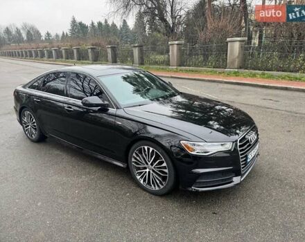 Чорний Ауді А6, об'ємом двигуна 1.98 л та пробігом 126 тис. км за 20300 $, фото 1 на Automoto.ua