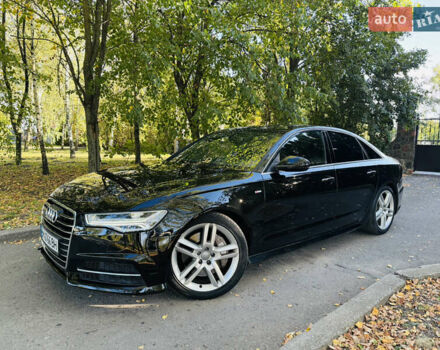 Черный Ауди А6, объемом двигателя 2 л и пробегом 68 тыс. км за 24500 $, фото 1 на Automoto.ua