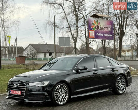 Черный Ауди А6, объемом двигателя 2 л и пробегом 158 тыс. км за 17500 $, фото 1 на Automoto.ua