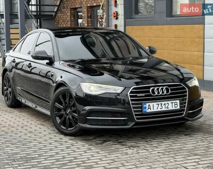 Черный Ауди А6, объемом двигателя 1.97 л и пробегом 196 тыс. км за 23000 $, фото 1 на Automoto.ua